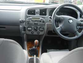 Click on this photo of the Nissan Primera SE 5DR HATCHBACK 5 door Manual to enlarge... for sale at Vines Cross Auto Exchange Ninfield