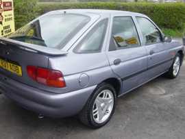 Click on this photo of the Ford Escort 1.8 Si 5 door Manual to enlarge... for sale at Vines Cross Auto Exchange Ninfield