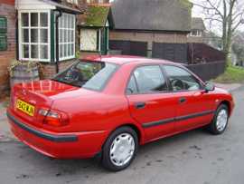 Click on this photo of the Mitsubishi Carisma 1.8 GDi 5 door to enlarge... for sale at Vines Cross Auto Exchange Ninfield